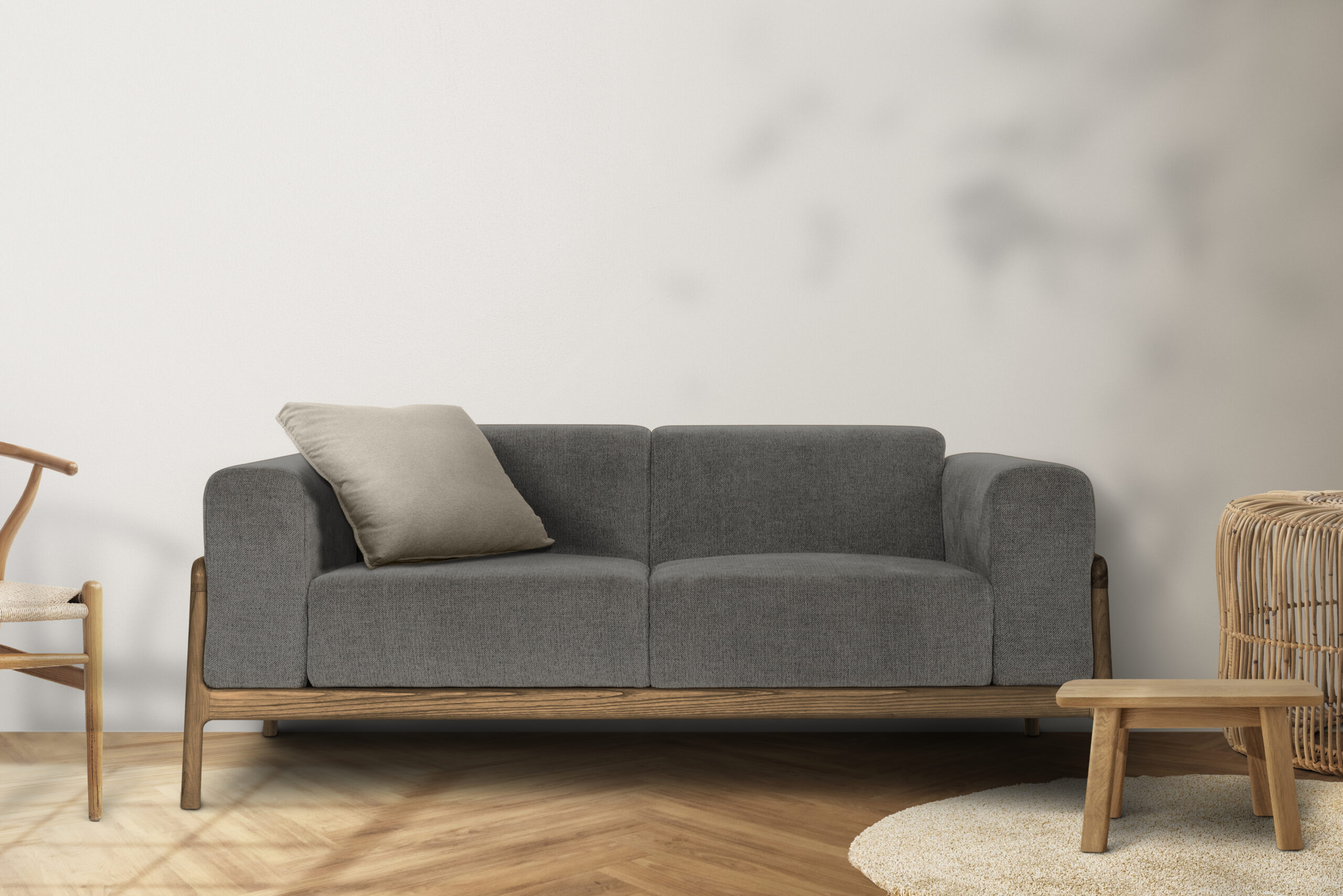 Minimal living room interior design with leaf shadow on a wall Sofá Compacto Gris Lía - Imagen 1